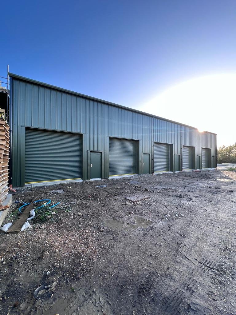 Steel buildings with roller shutter doors