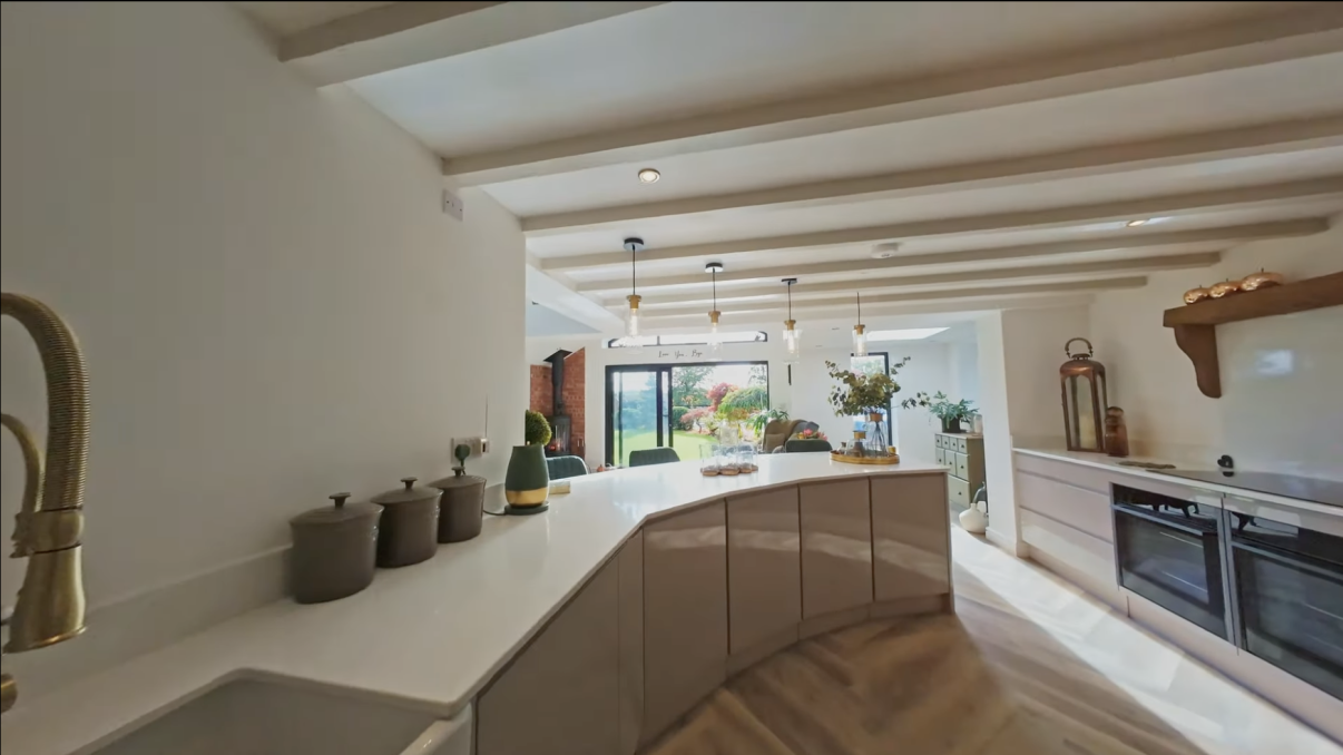 Finished kitchen-diner with a curved island